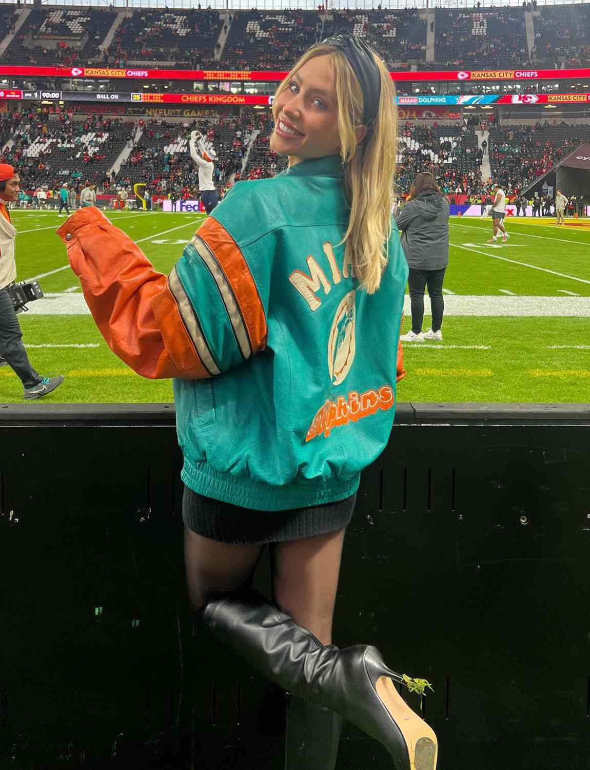 Alix Earle rocks vintage Miami Dolphins jacket