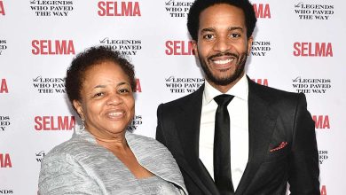 Andre Holland (R) and his mother attend the