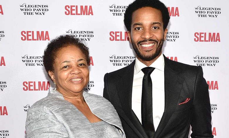 Andre Holland (R) and his mother attend the