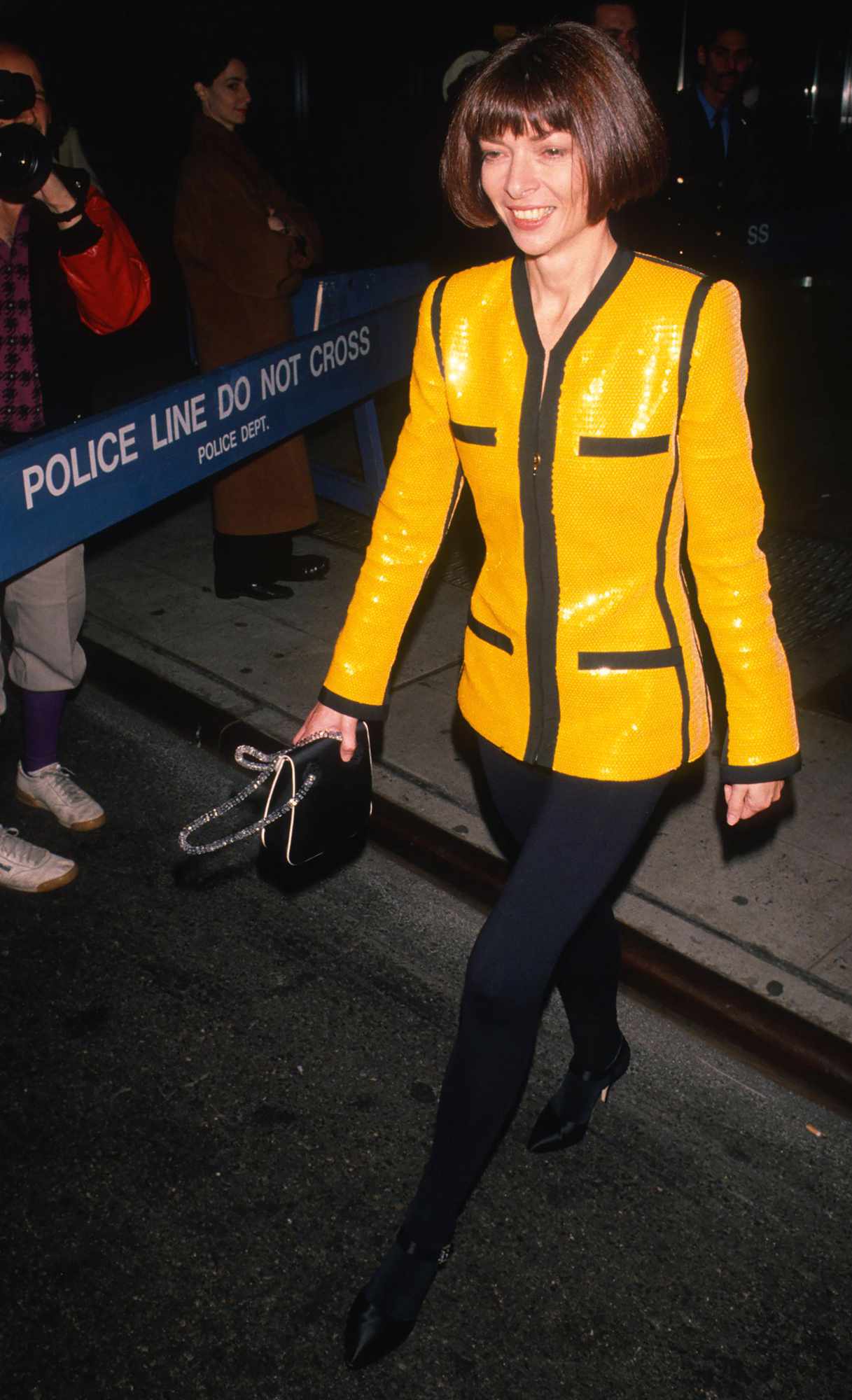 British-American editor and journalist Anna Wintour attends a 'Made In Milan' screening party at Giogrio Armani Bouqitue, New York, New York, October 31, 1990.