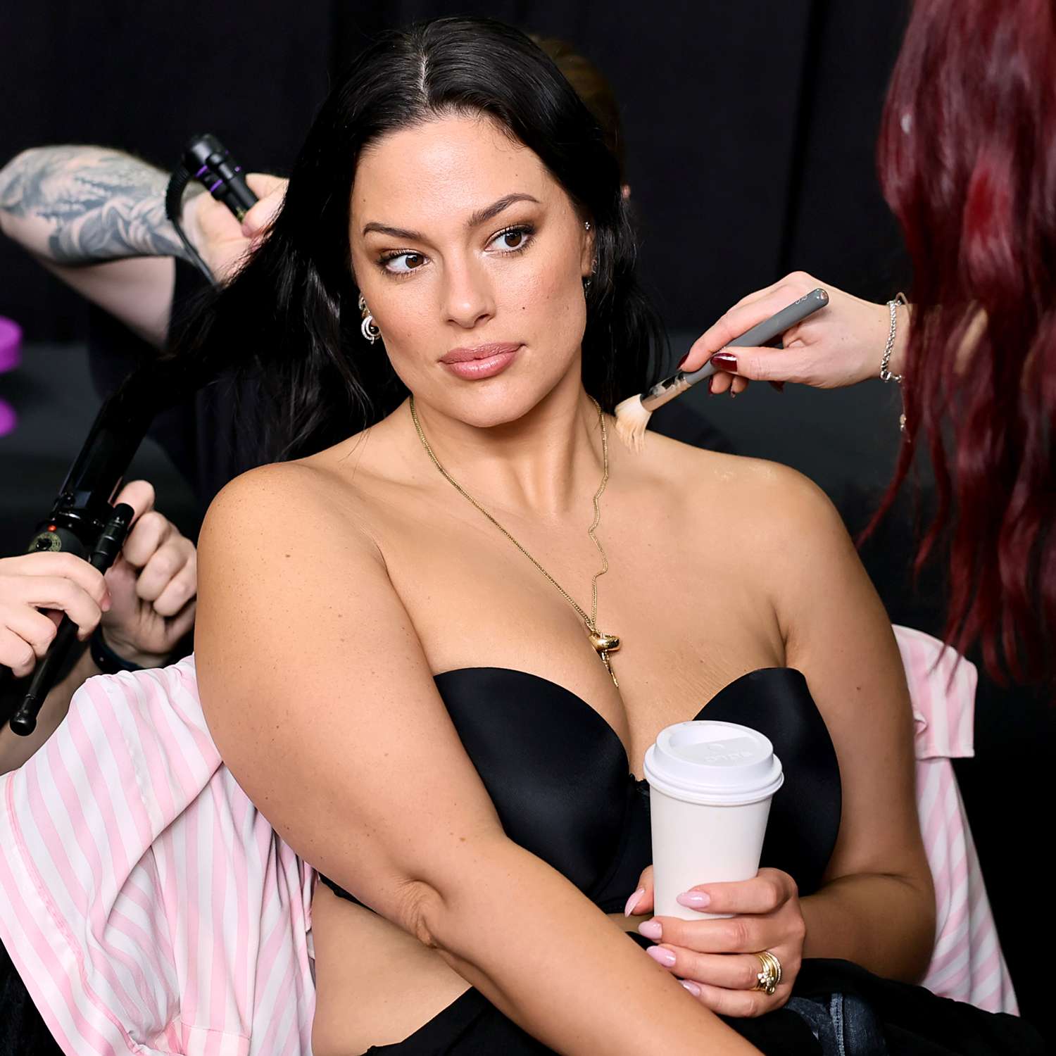 Ashley Graham prepares backstage during the Victoria's Secret Fashion Show 2024 at Duggal 