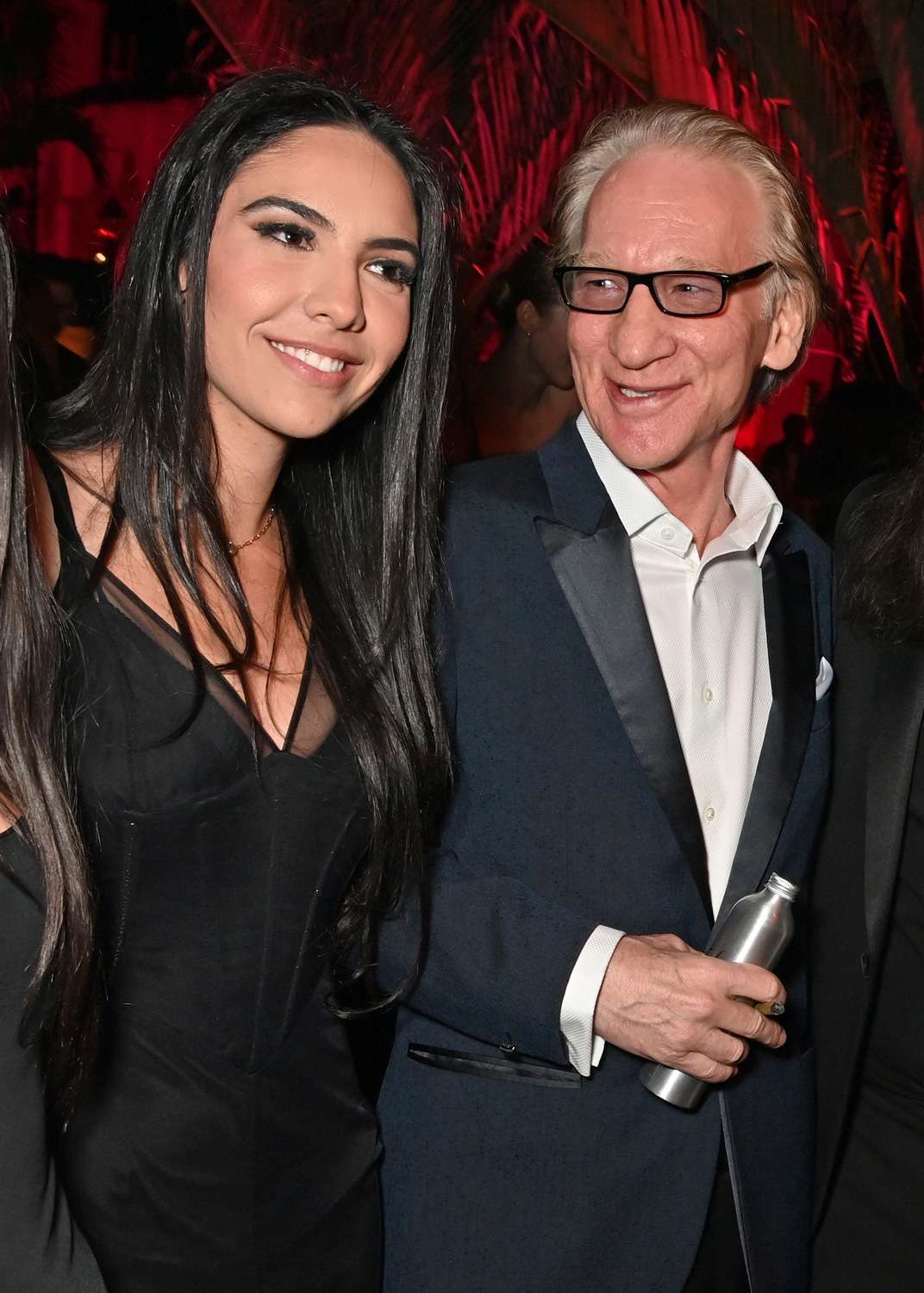 Noor Alfallah, Bill Maher attend the 2024 Vanity Fair Oscar Party Hosted By Radhika Jones at Wallis Annenberg Center for the Performing Arts on March 10, 2024 in Beverly Hills, California.