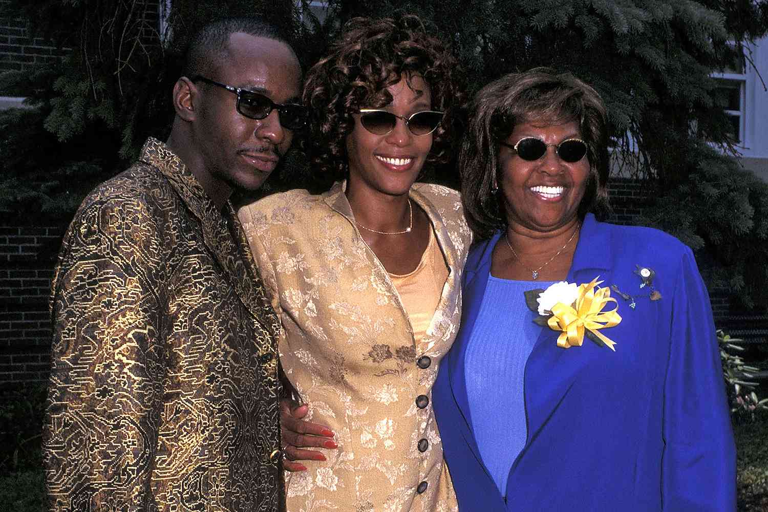 Singer Bobby Brown, singer Whitney Houston and mother Cissy Houston attend the Franklin School Renaming Annoucement to the Whitney E. Houston Academy of Creative & Performing Arts on June 12, 1997 at the Whitney E. Houston Academy of Creative & Performing Arts in East Orange, New Jersey.