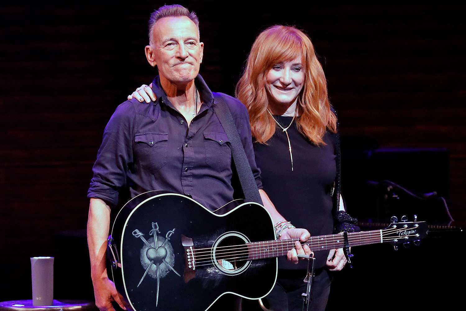 Bruce Springsteen and Patti Scialfa take a bow during reopening night of "Springsteen on Broadway" for a full-capacity, vaccinated audience at St. James Theatre on June 26, 2021 in New York City.