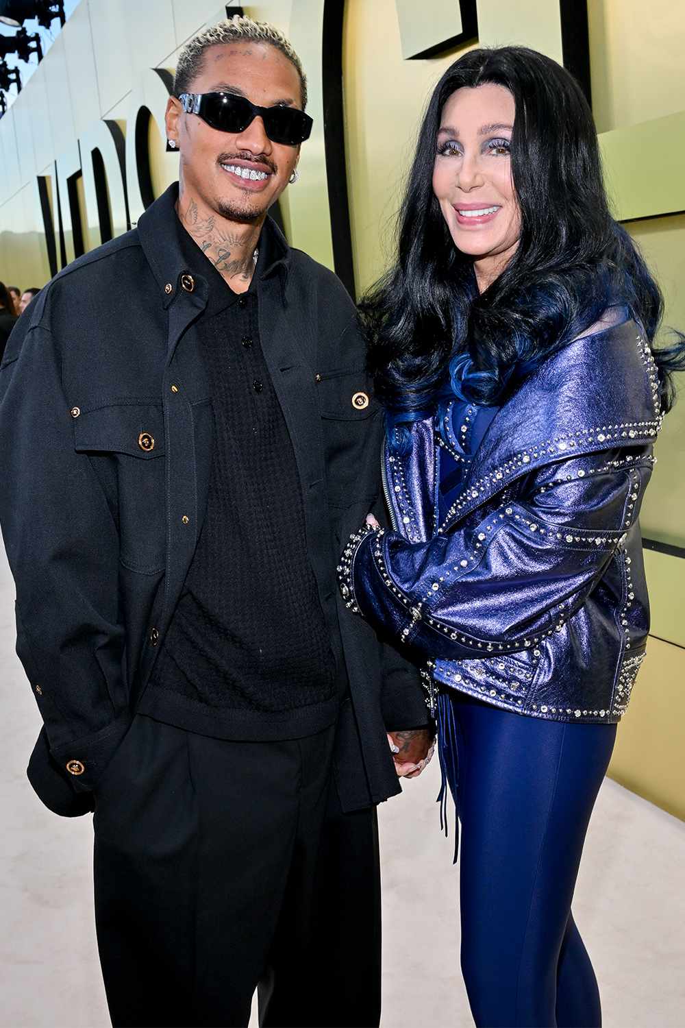 Alexander A.E. Edwards and Cher at the Versace Fall-Winter 2023 Fashion Show held at Pacific Design Center on March 9, 2023 in West Hollywood, California. (Photo by Michael Buckner/Variety via Getty Images)