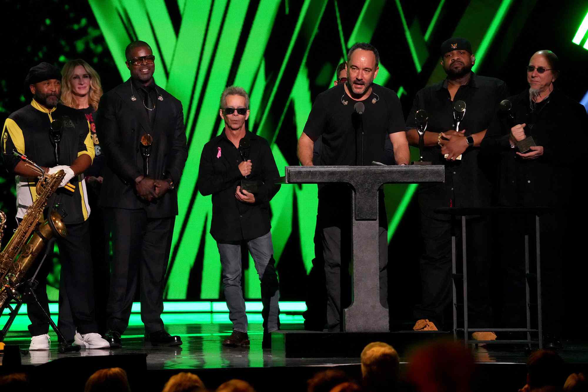 Dave Matthews Band Inductees Carter Beauford, Buddy Strong, Tim Reynolds, Dave Matthews, Rashawn Ross, and Jeff Coffinonstage at the 2024 Rock & Roll Hall Of Fame Induction Ceremony at Rocket Mortgage Fieldhouse on October 19, 2024 in Cleveland, Ohio.