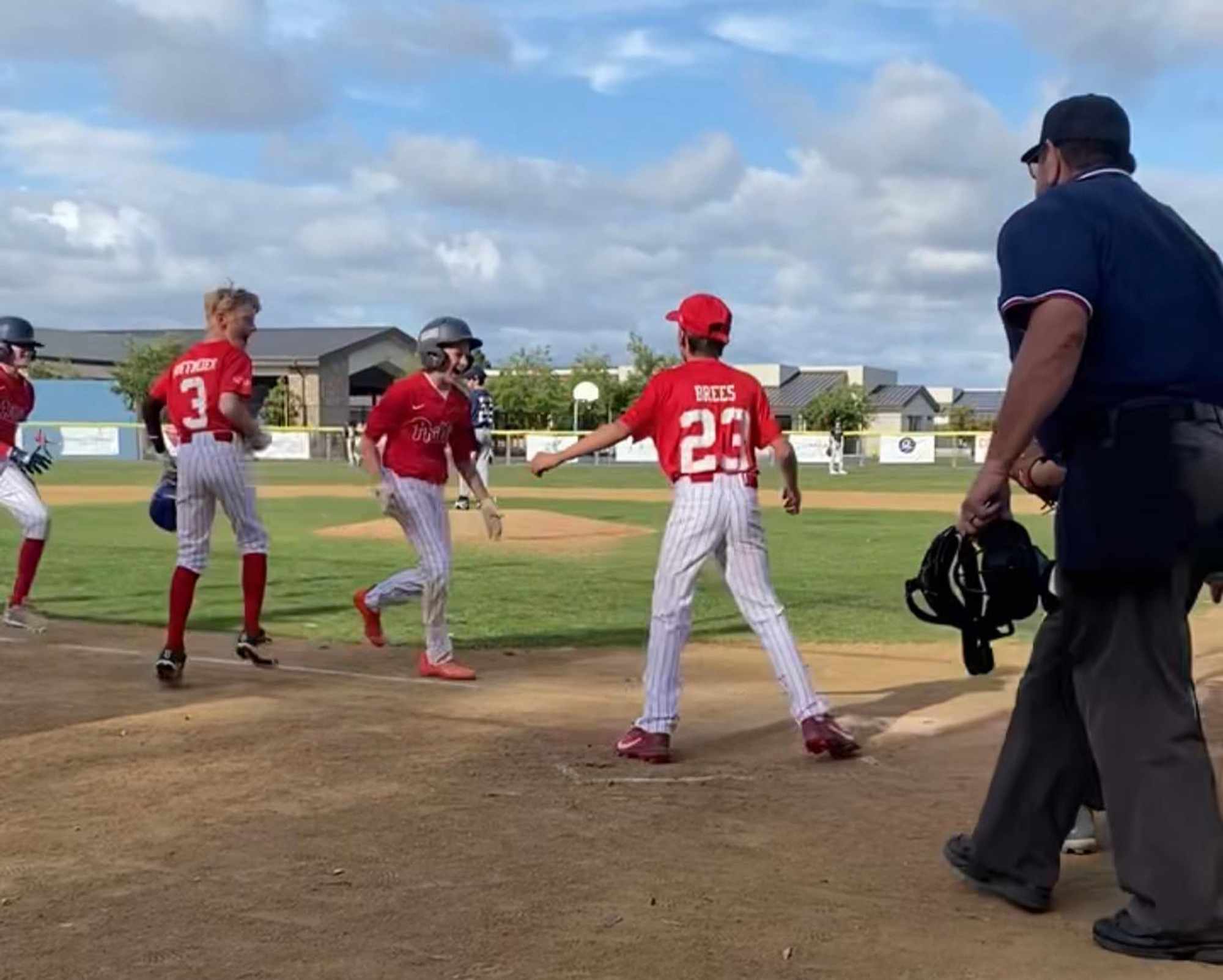 Drew Brees' son durring a baseball game