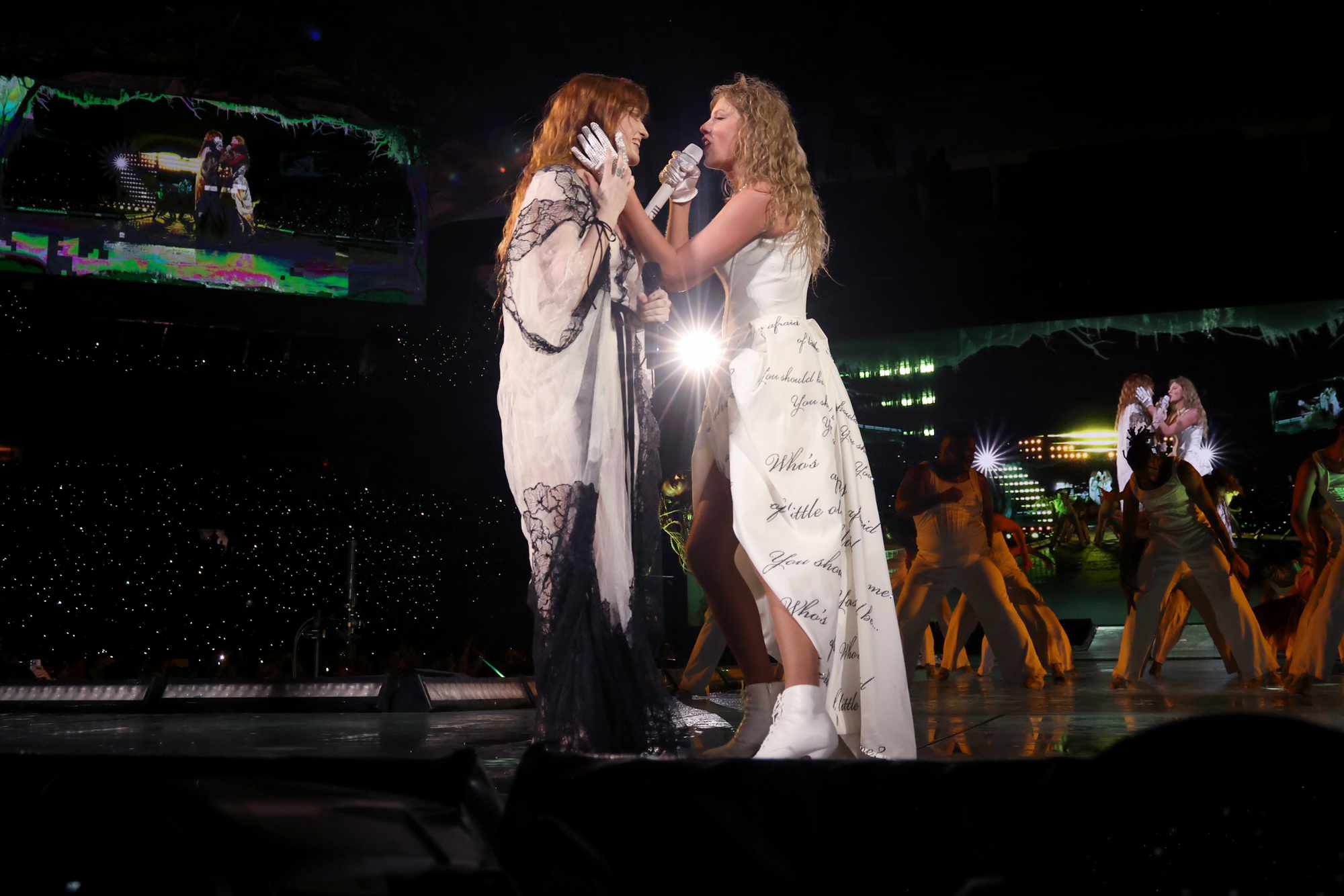 Florence Welch of Florence + The Machine and Taylor Swift perform onstage during The Eras Tour at Hard Rock Stadium on October 18, 2024 in Miami Gardens, Florida.