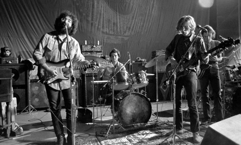 Music group The Grateful Dead with Ron Pigpen McKernan on keyboards, Jerry Garcia, Bill Kreutzmann on drums, Phil Lesh and Bob Weir perform on stage during