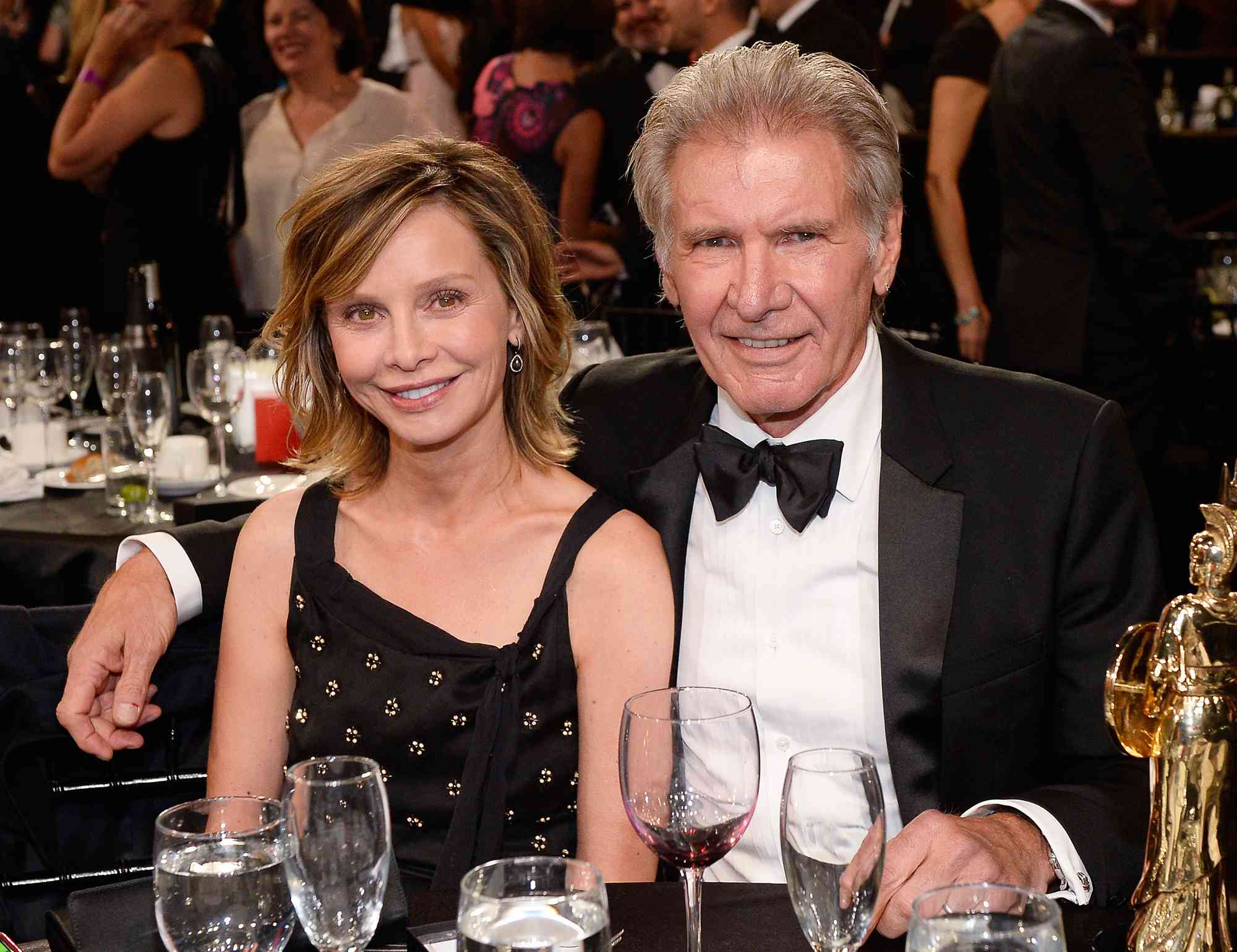 Calista Flockhart (L) and honoree Harrison Ford pose with the the Albert R. Broccoli Britannia Award for Worldwide Contribution to Entertainment at the 2015 Jaguar Land Rover British Academy Britannia Awards presented by American Airlines at The Beverly Hilton Hotel on October 30, 2015 in Beverly Hills, California