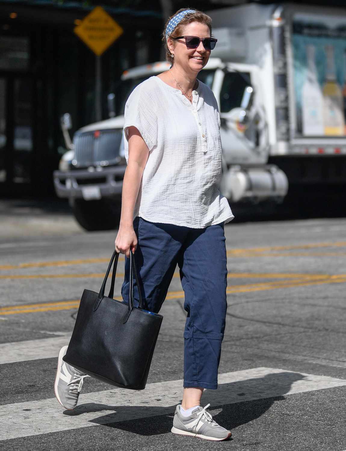 Jenna Fischer flashes a smile after news that she is cancer free in Los Angeles.