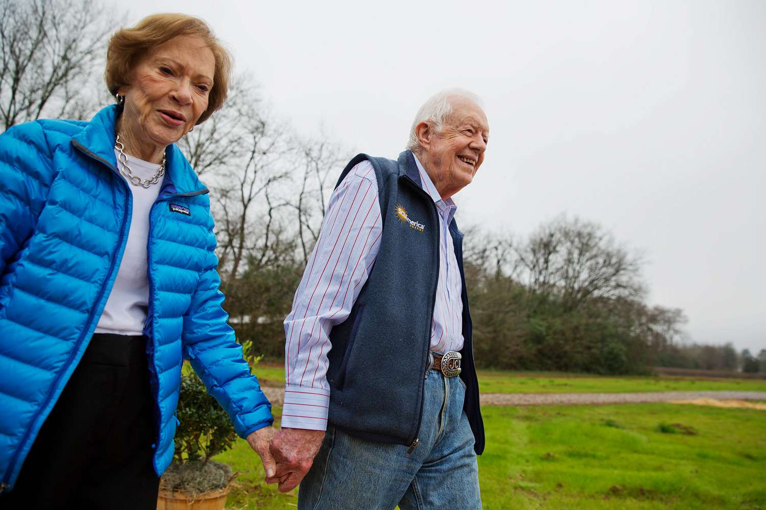 former President Jimmy Carter, right, and his wife Rosalynn arrive for a ribbon cutting ceremony for a solar panel project on farmland he owns in their hometown of Plains, Ga. Jimmy and Rosalynn are celebrating their 77th wedding anniversary, Friday, July 7, 2023