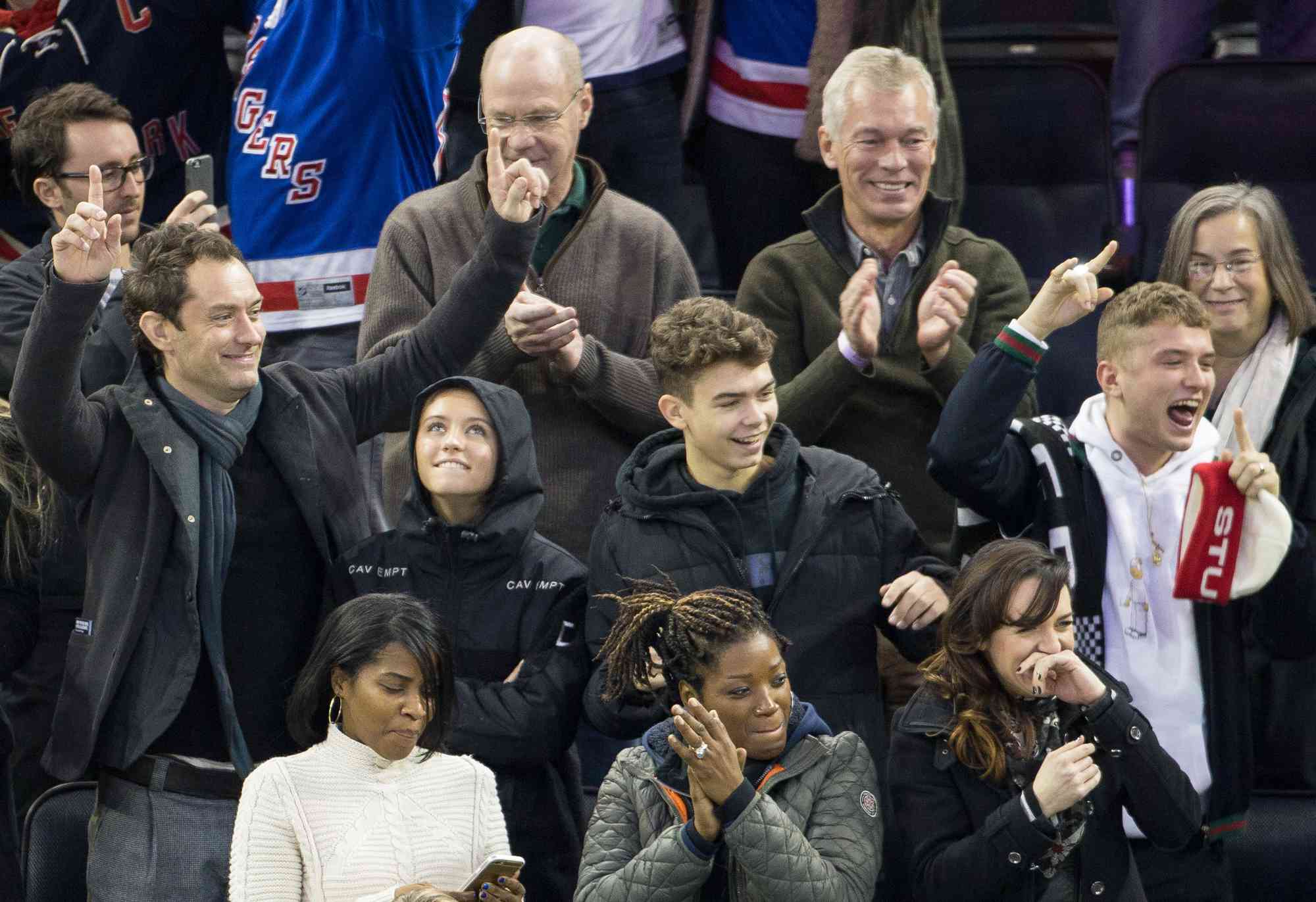 Philipa Coan, Jude Law, Iris Law, Rudy Law and Rafferty Law are seen at Madison Square Garden on December 18, 2016