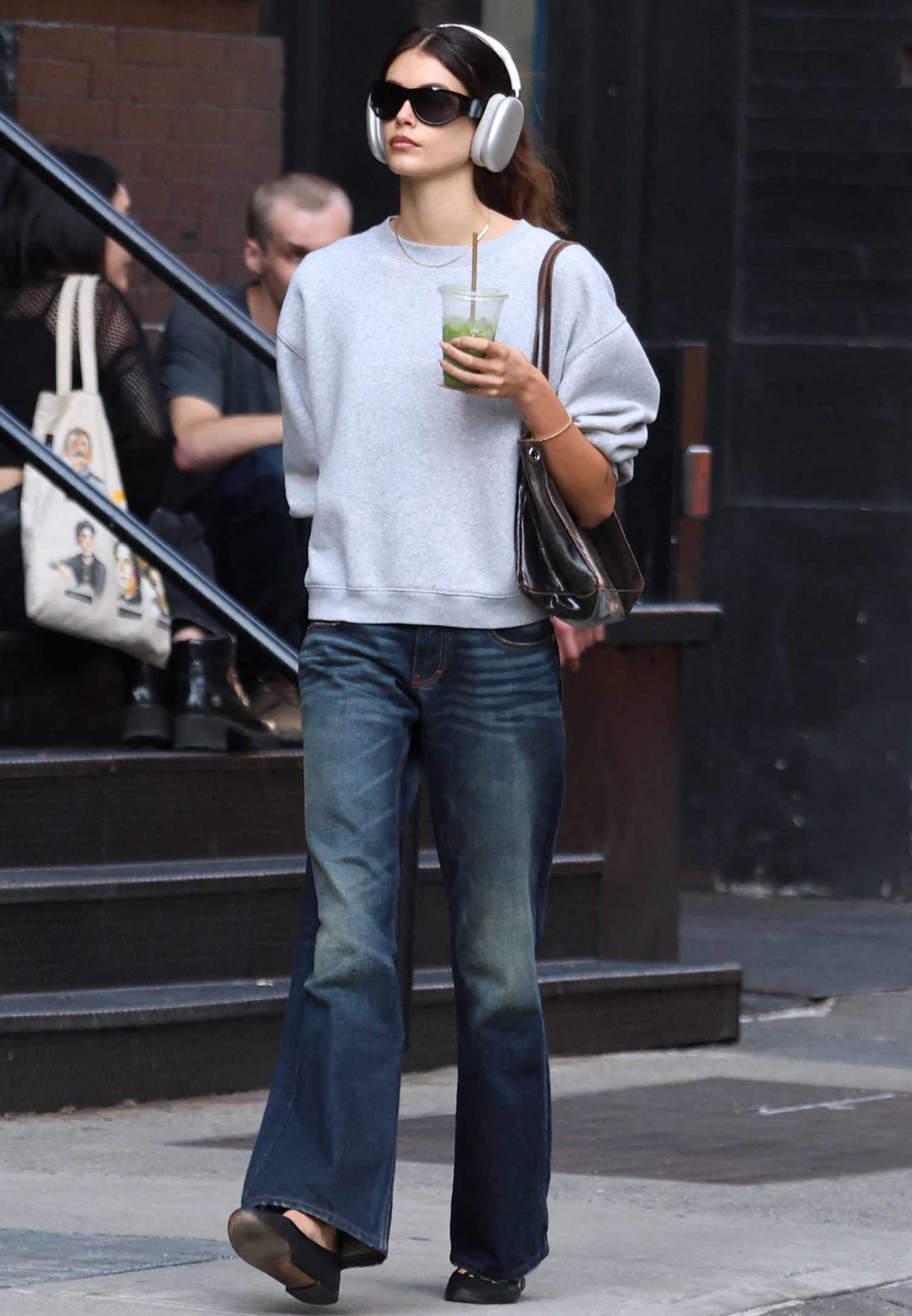 Kaia Gerber is walking with style on the street in Soho