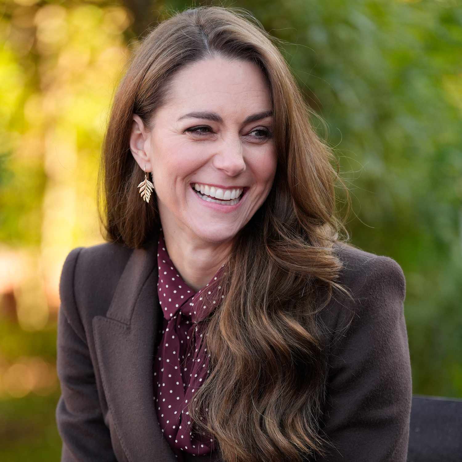 Catherine, Princess of Wales speaks with members of the Emergency Services during a visit to Southport kate middleton