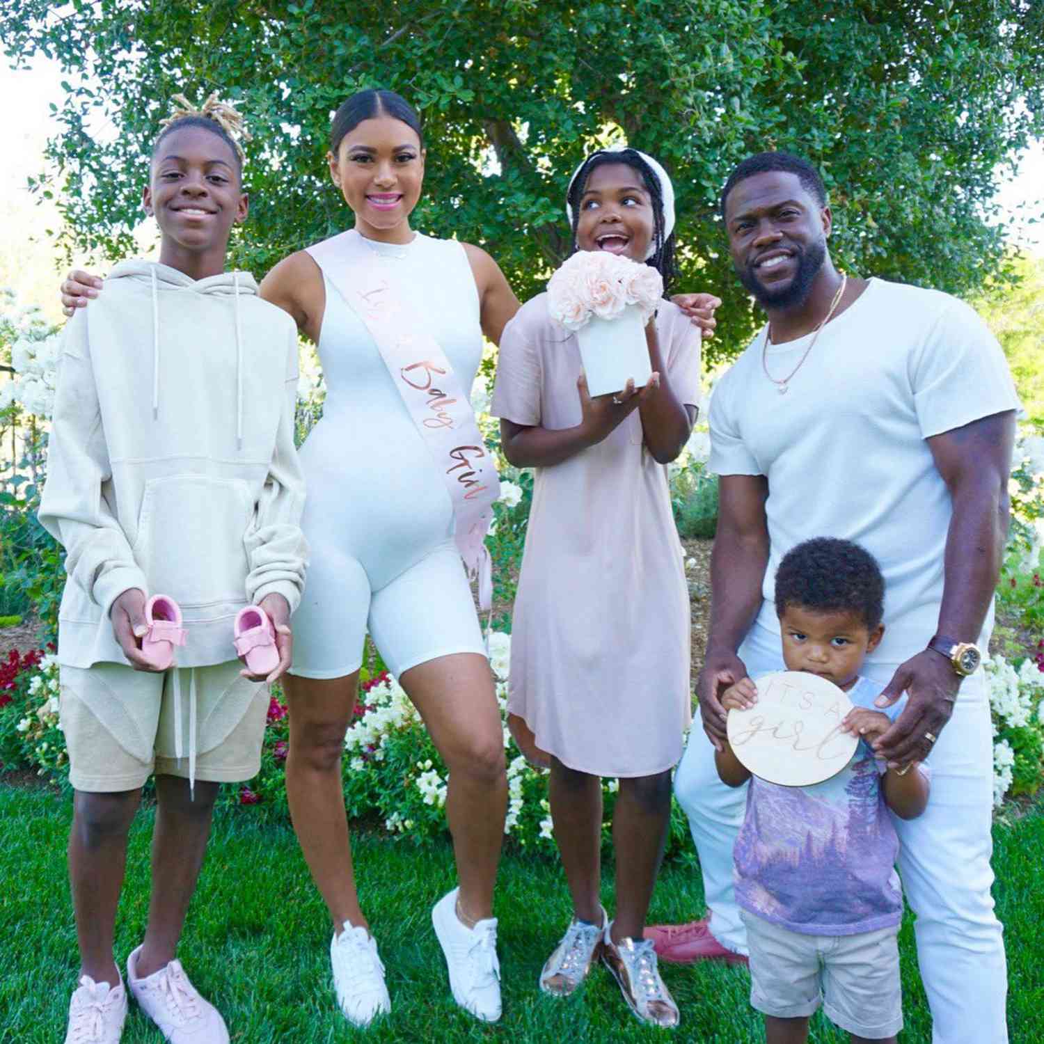 Kevin and Eniko Hart with kids at baby shower