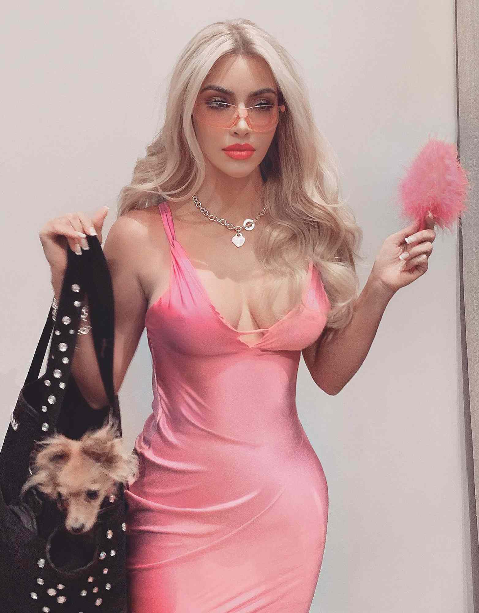 Kim Kardashian wearing a pink dress as Elle Woods from 'Legally Blonde' in 2019