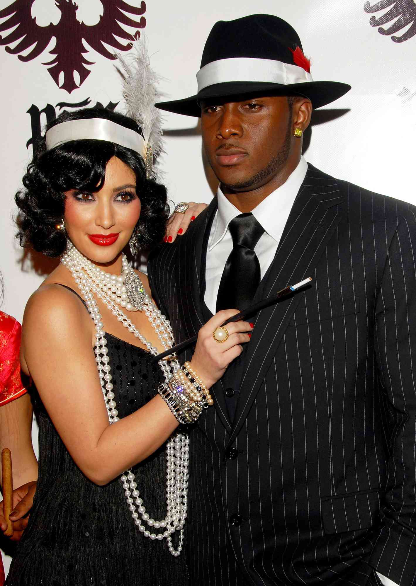 Kim Kardashian and Reggie Bush attend the Pur Jeans Halloween Bash at STK on Oct. 31, 2008