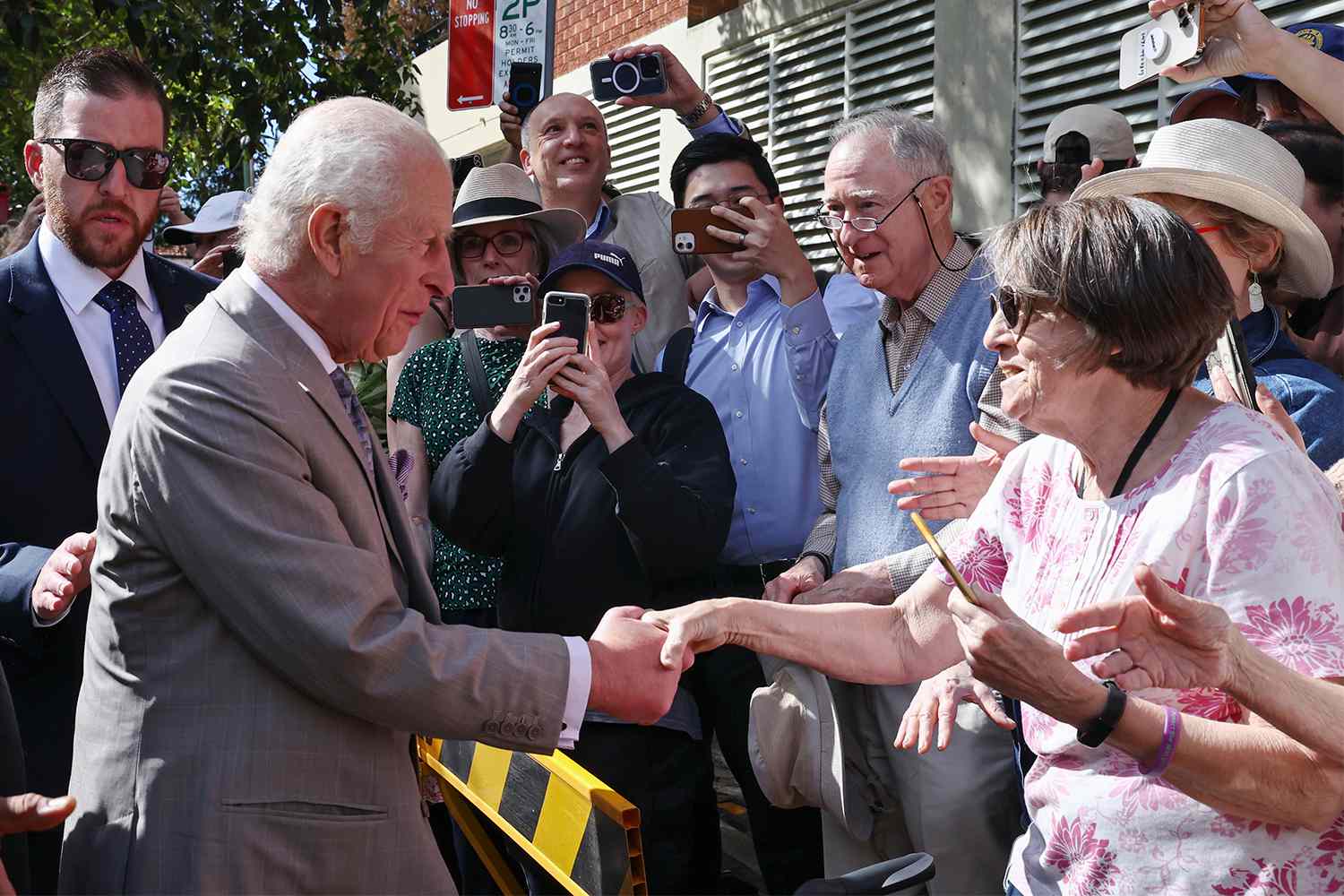 King Charles III greets the public during a visit to the Melanoma Institute of Australia on October 22, 2024 in Sydney, 