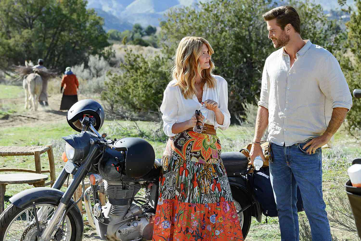 Laura Dern as Katherine Loewe and Liam Hemsworth as Owen Brophy in Lonely Planet.