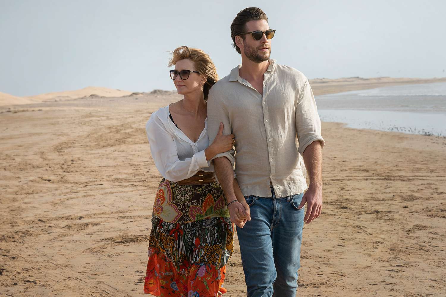 Laura Dern as Katherine Loewe and Liam Hemsworth as Owen Brophy in Lonely Planet.