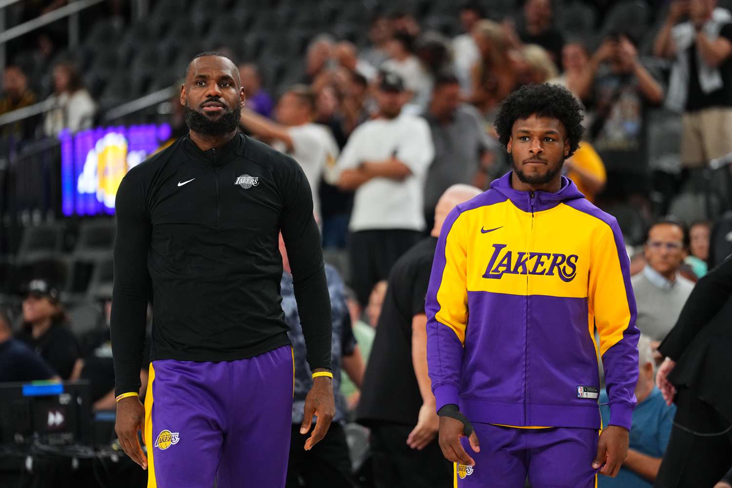 LeBron James #23 and Bronny James #9 of the Los Angeles Lakers warms up before the game before the game against the Golden State Warriors during the 2024 NBA Preseason on October 15, 2024