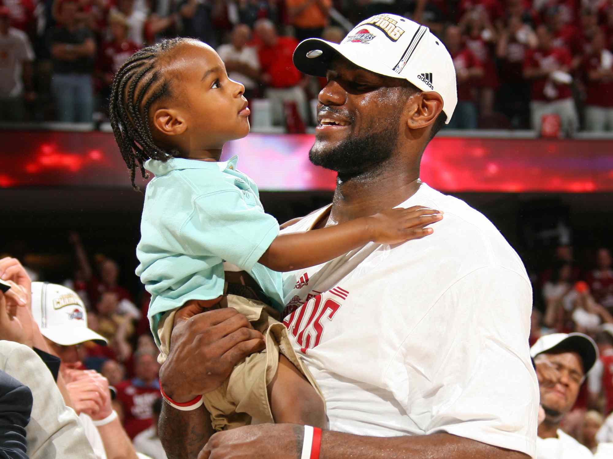 LeBron James #23 of the Cleveland Cavaliers holds his son LeBron Jr. following the Cavaliers victory in Game Six of the Eastern Conference Finals during the 2007 NBA Playoffs