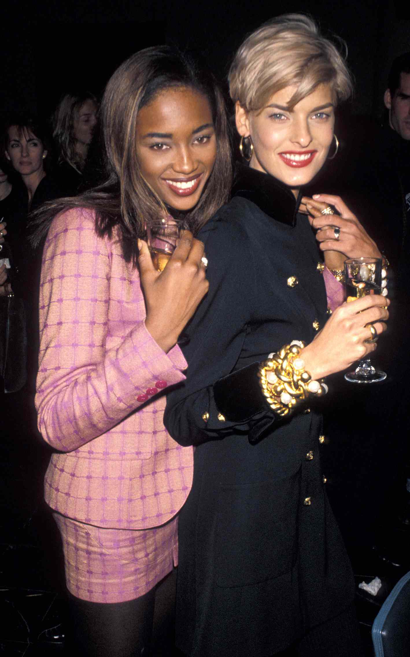 Yasmin Lebon's Birthday Party - October 29, 1990 - Naomi Campbell and Linda Evangelista at the Falls Restaurant in New York City, New York