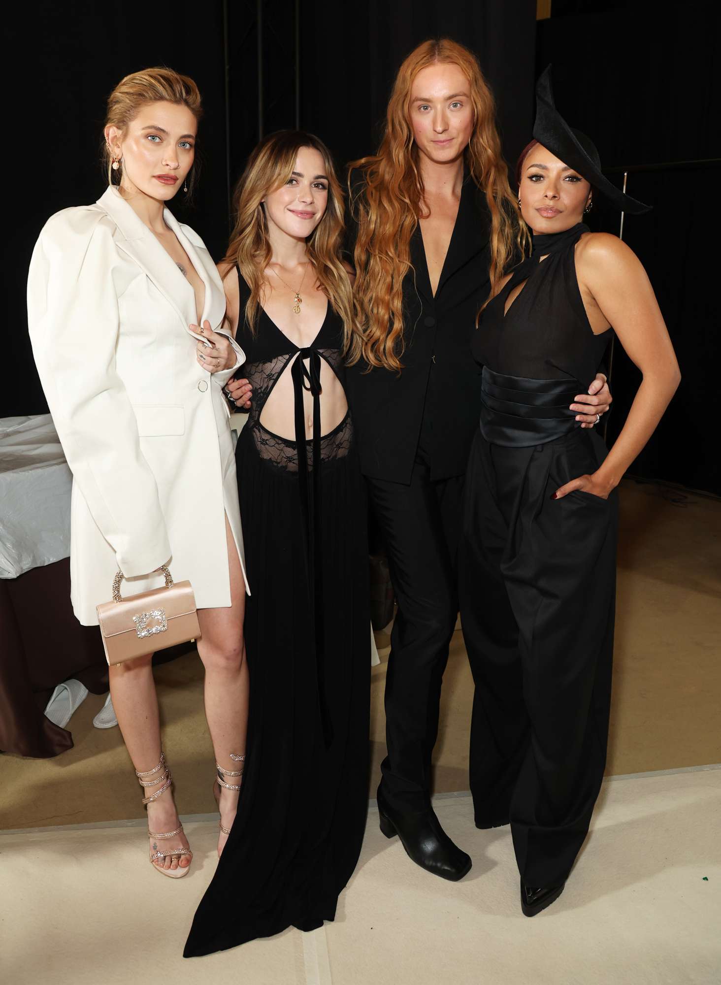 Paris Jackson, Kiernan Shipka, Harris Reed and Kat Graham pose backstage following the Nina Ricci show during Paris Fashion Week Womenswear Spring-Summer 2025 at Hotel Potocki on September 27, 2024 in Paris, France.