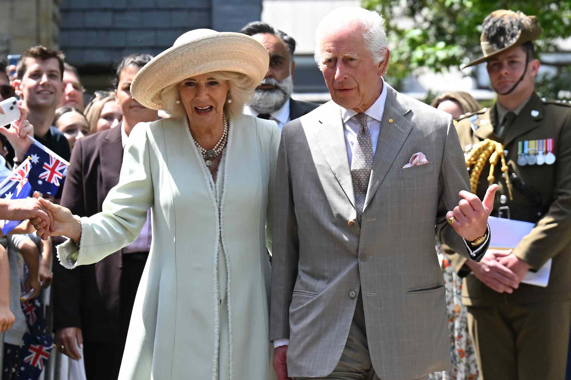  King Charles III and Queen Camilla depart following a service at St. Thomas's Anglican Church on October 20, 2024 in Sydney, Australia. The King's visit to Australia will be his first as Monarch, and CHOGM in Samoa will be his first as Head of the Commonwealth. (