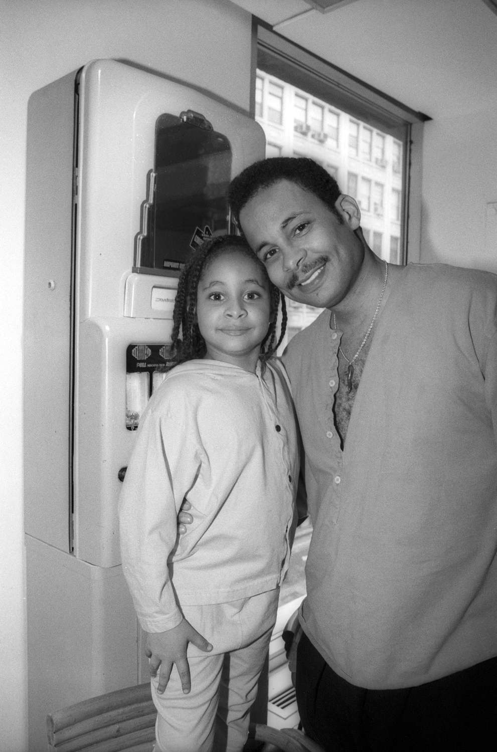 Seven-year-old Raven-Symone appears in a photo with her father when she records her "Here's To New Dreams" album and CD at Soundtracks Studios on May 15, 1992 in New York City.