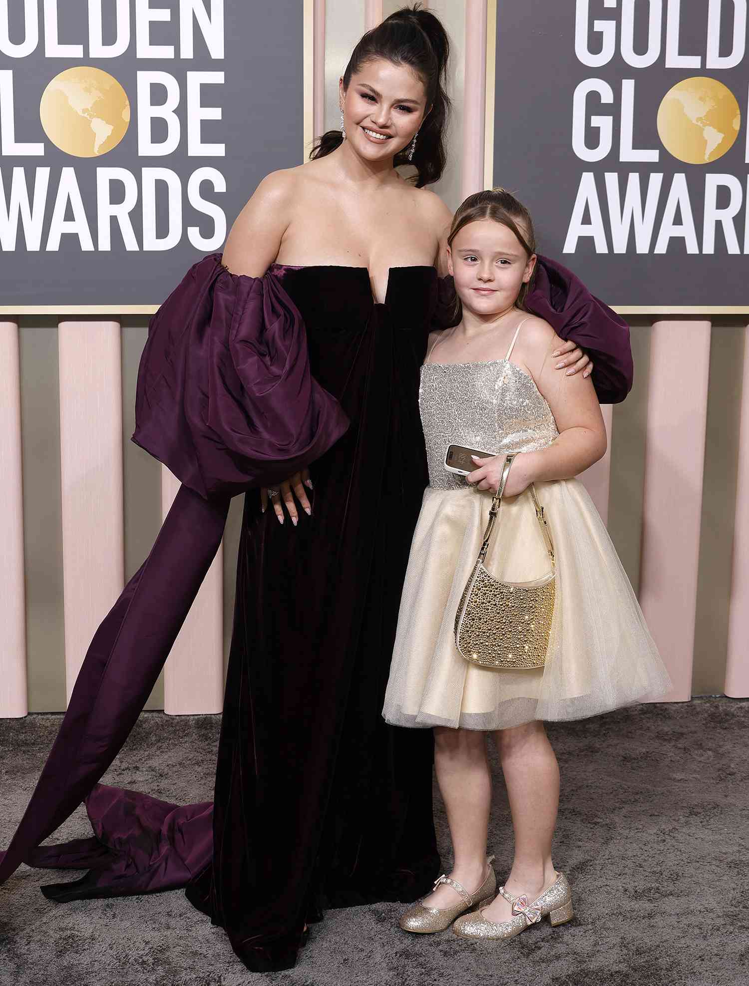 Selena Gomez and Gracie Elliot Teefey attend the 80th Annual Golden Globe Awards