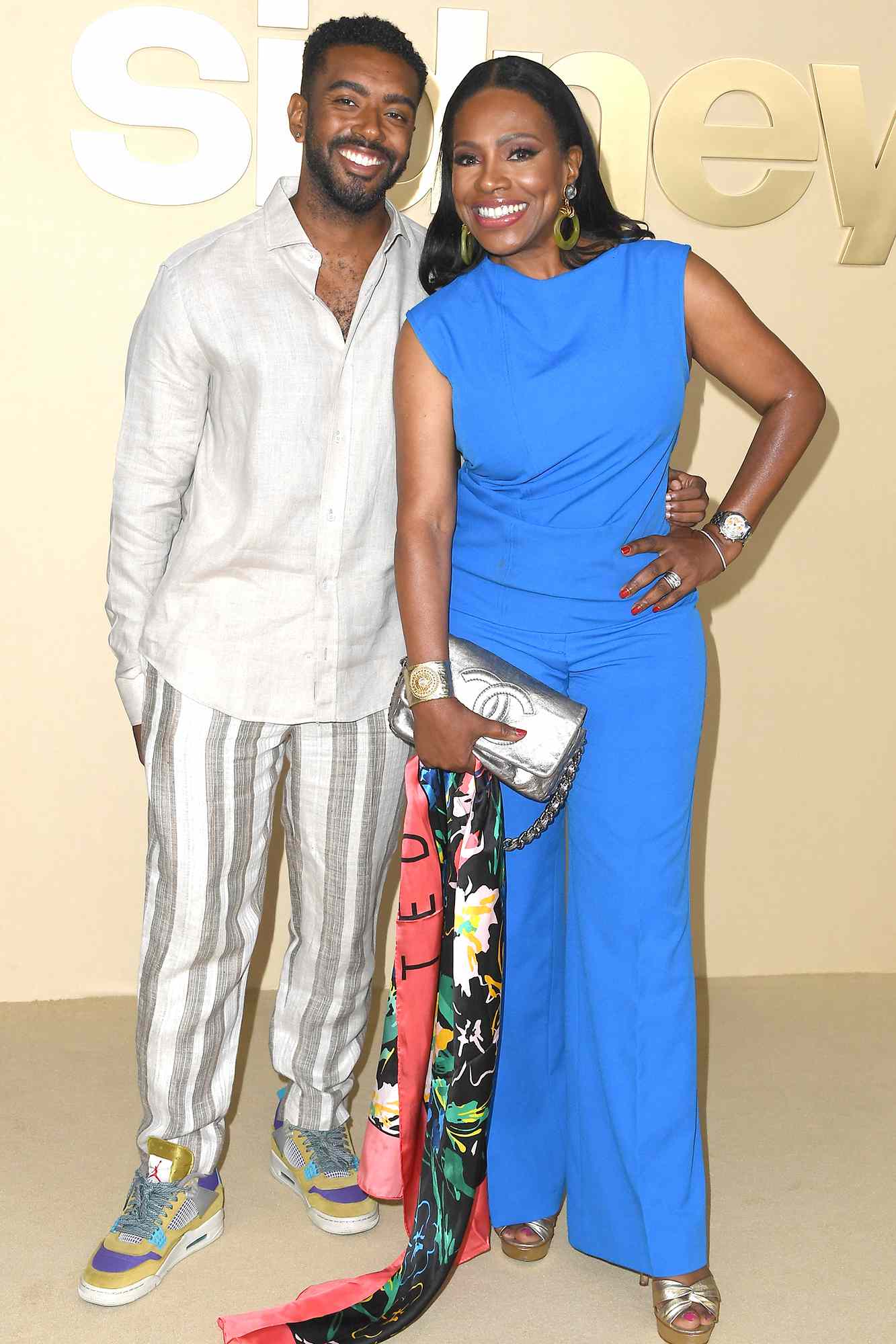 Etienne Maurice, Sheryl Lee Ralph arrives at the Premiere Of Apple TV +'s "Sidney" on September 21, 2022 in Los Angeles, California. 