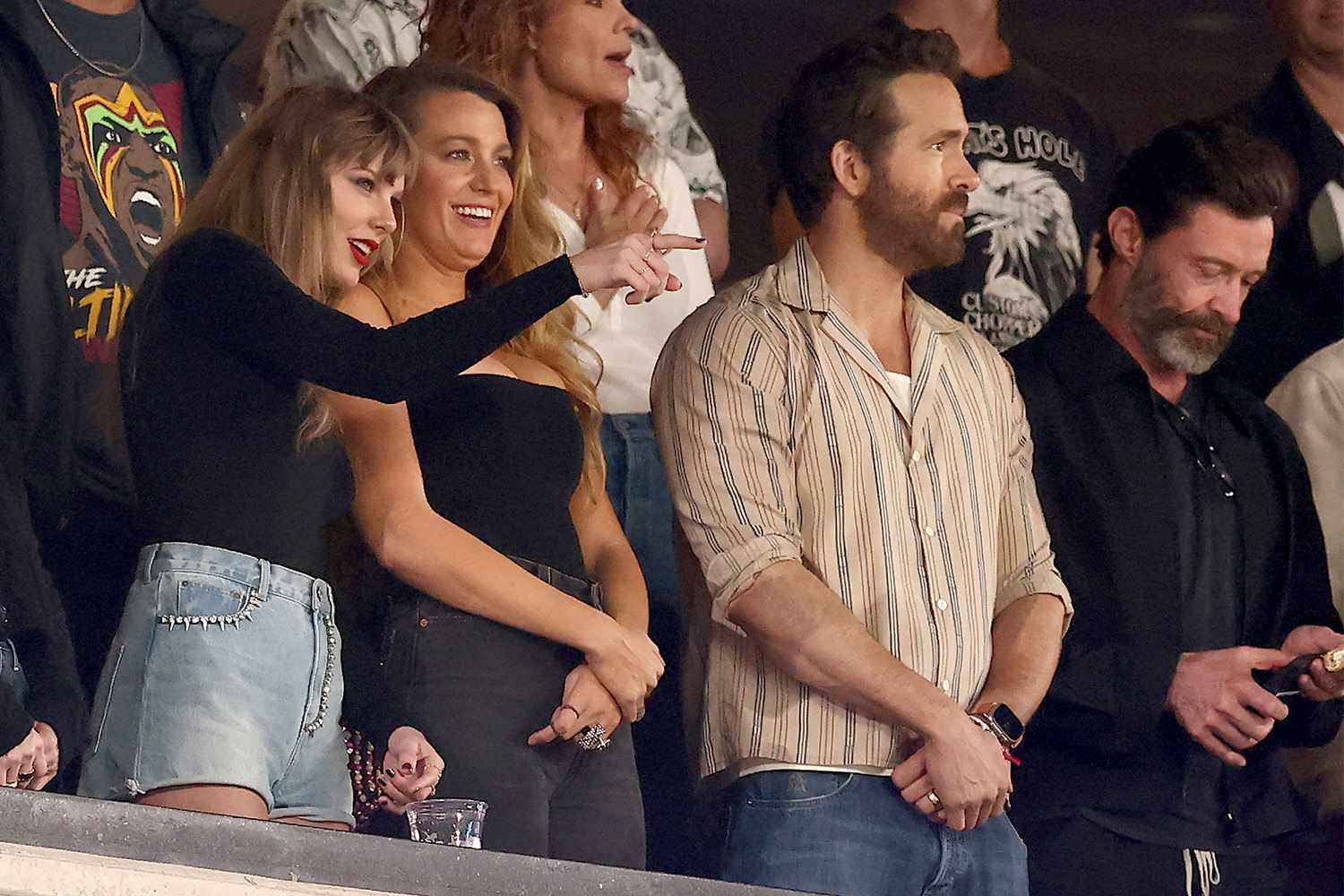 Singer Taylor Swift and Actor Ryan Reynolds look on prior to the game between the Kansas City Chiefs and the New York Jets at MetLife Stadium on October 01, 2023 in East Rutherford, New Jersey