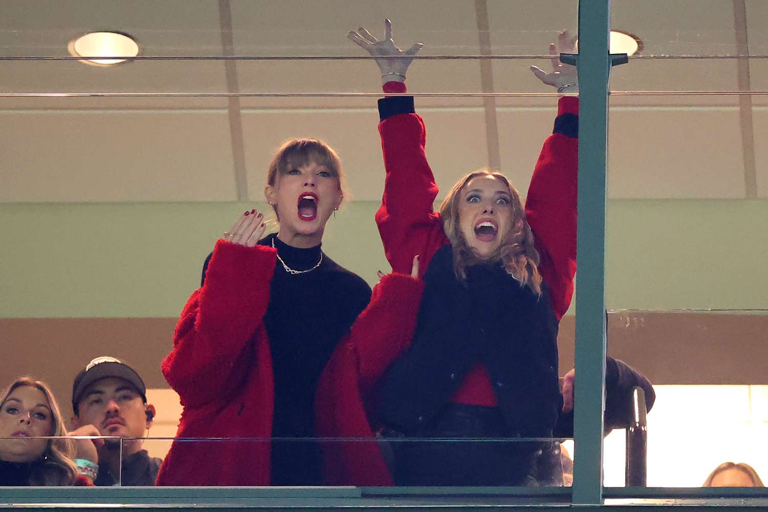 Taylor Swift and Brittany Mahomes react in a suite during the game between the Kansas City Chiefs and the Green Bay Packers