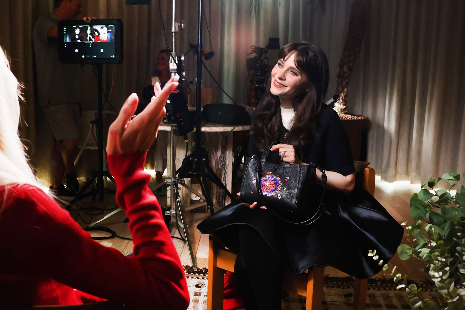 Zooey Deschanel doing press for Vera Bradley