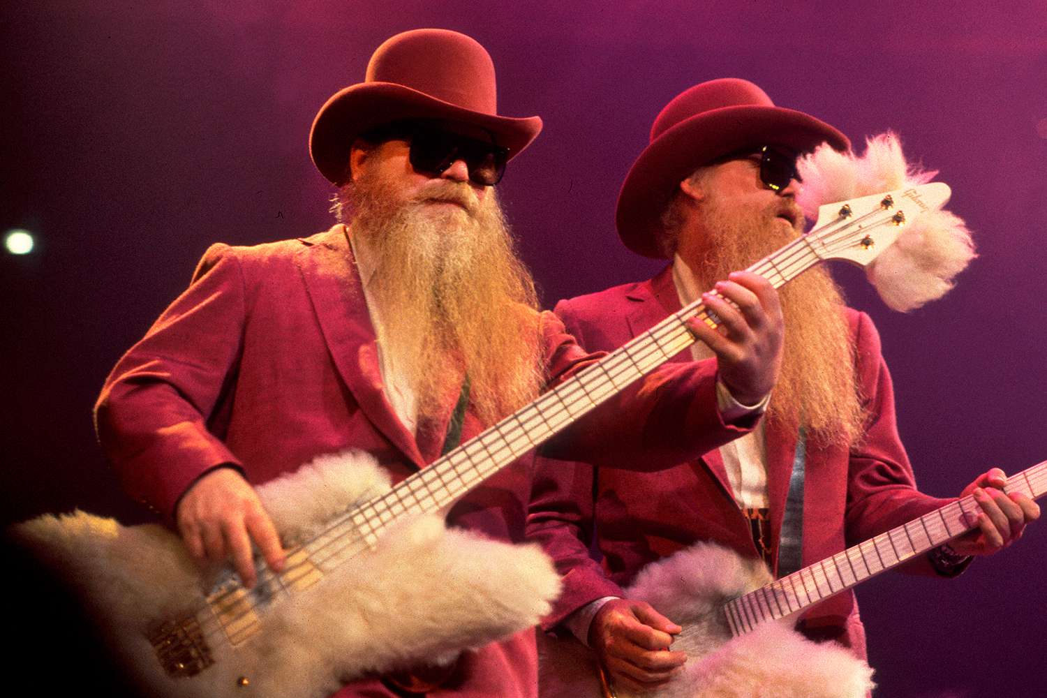 American Rock musicians Dusty Hill (left)and Billy Gibbons, both of the group ZZ Top, perform onstage at the Bradley Center, Milwaukee, Wisconsin, October 31, 1990.