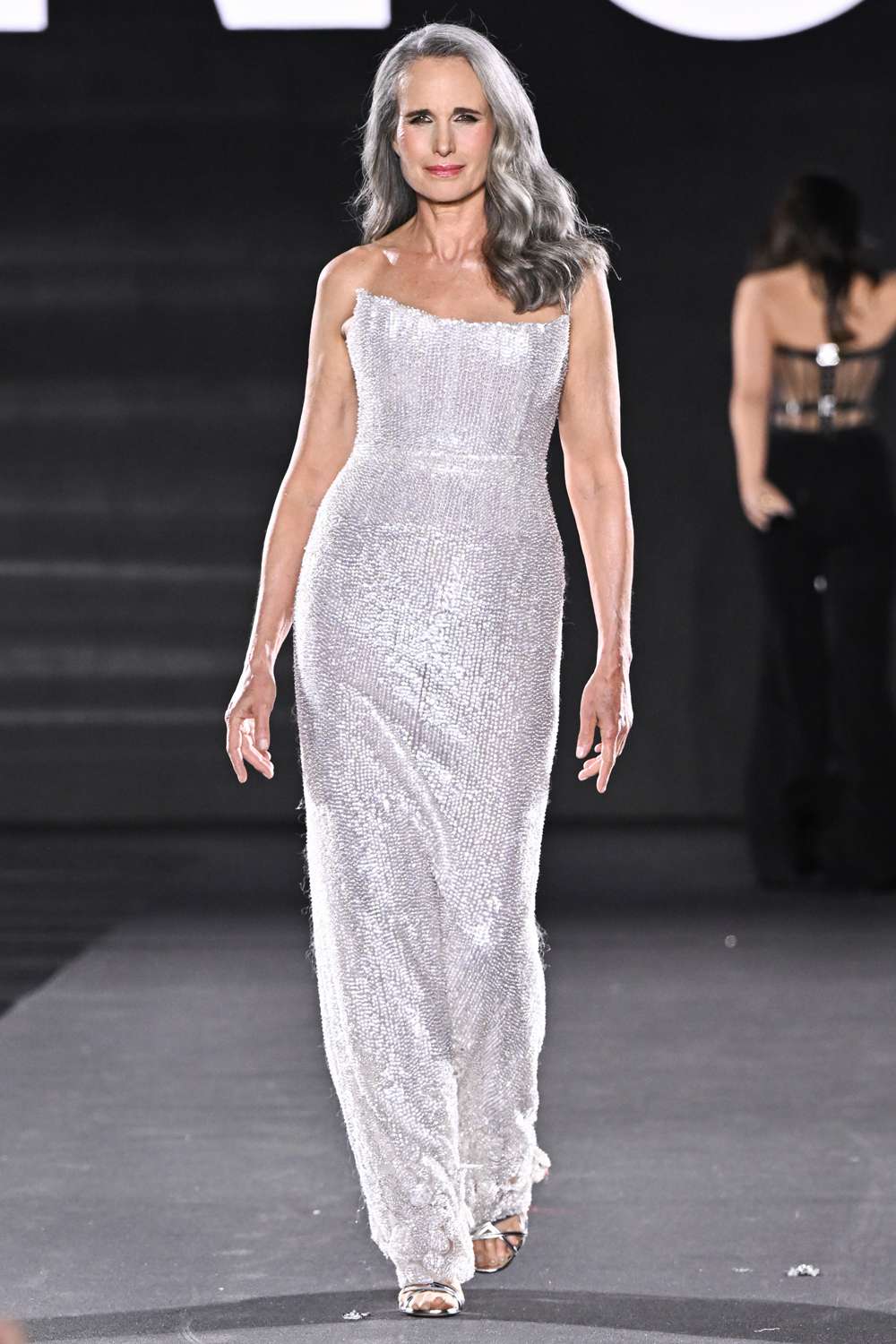 Andie MacDowell walks the runway during "Le Défilé L'Oréal Paris – Walk Your Worth" Womenswear Spring-Summer 2025 show as part of Paris Fashion Week on September 23, 2024