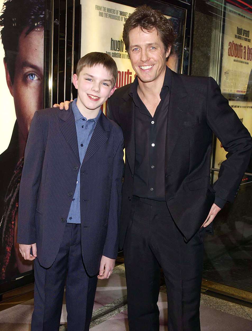 Hugh Grant & Nicholas Hoult, "About A Boy" Movie Premiere & Party Held At The Empire Cinema In Leicester Sqaure