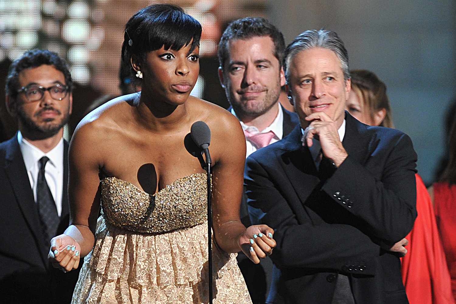 Jessica Williams and Jon Stewart accept an award onstage at The Comedy Awards 2012 at Hammerstein Ballroom on April 28, 2012 in New York City. 