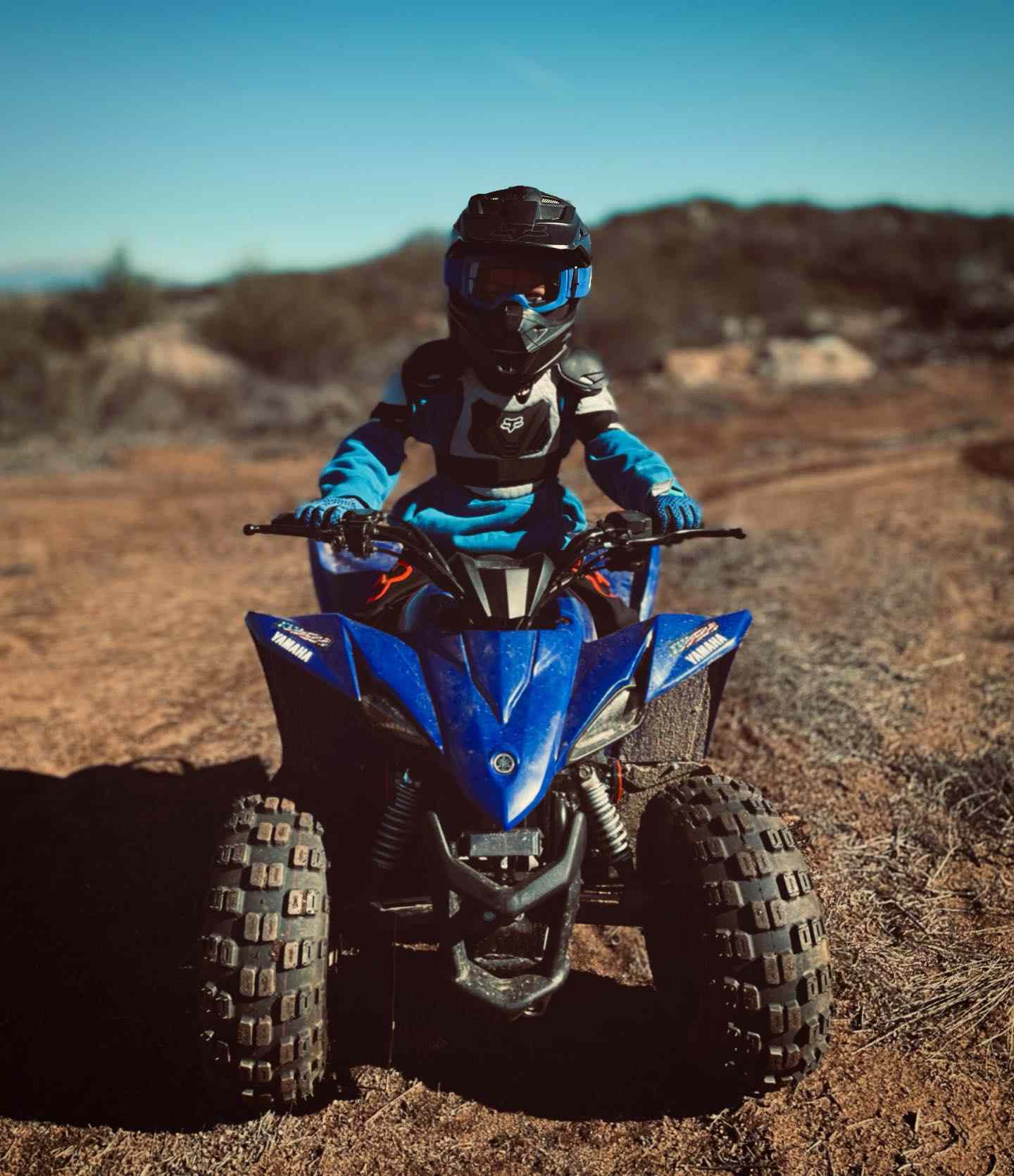 Kelis' son Shepherd riding an ATV in December 2021.