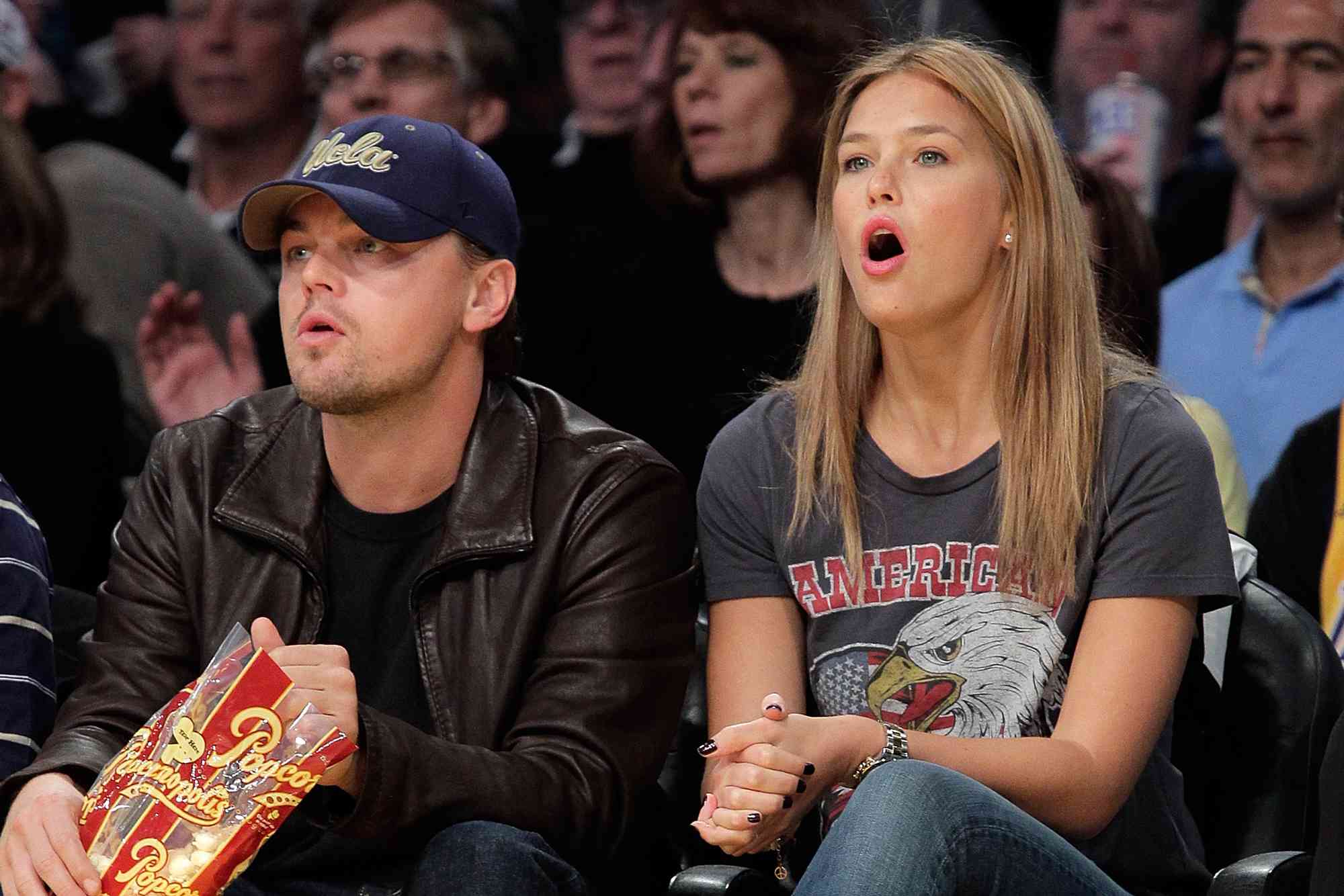 Leonardo DiCaprio (L) and Bar Refaeli 