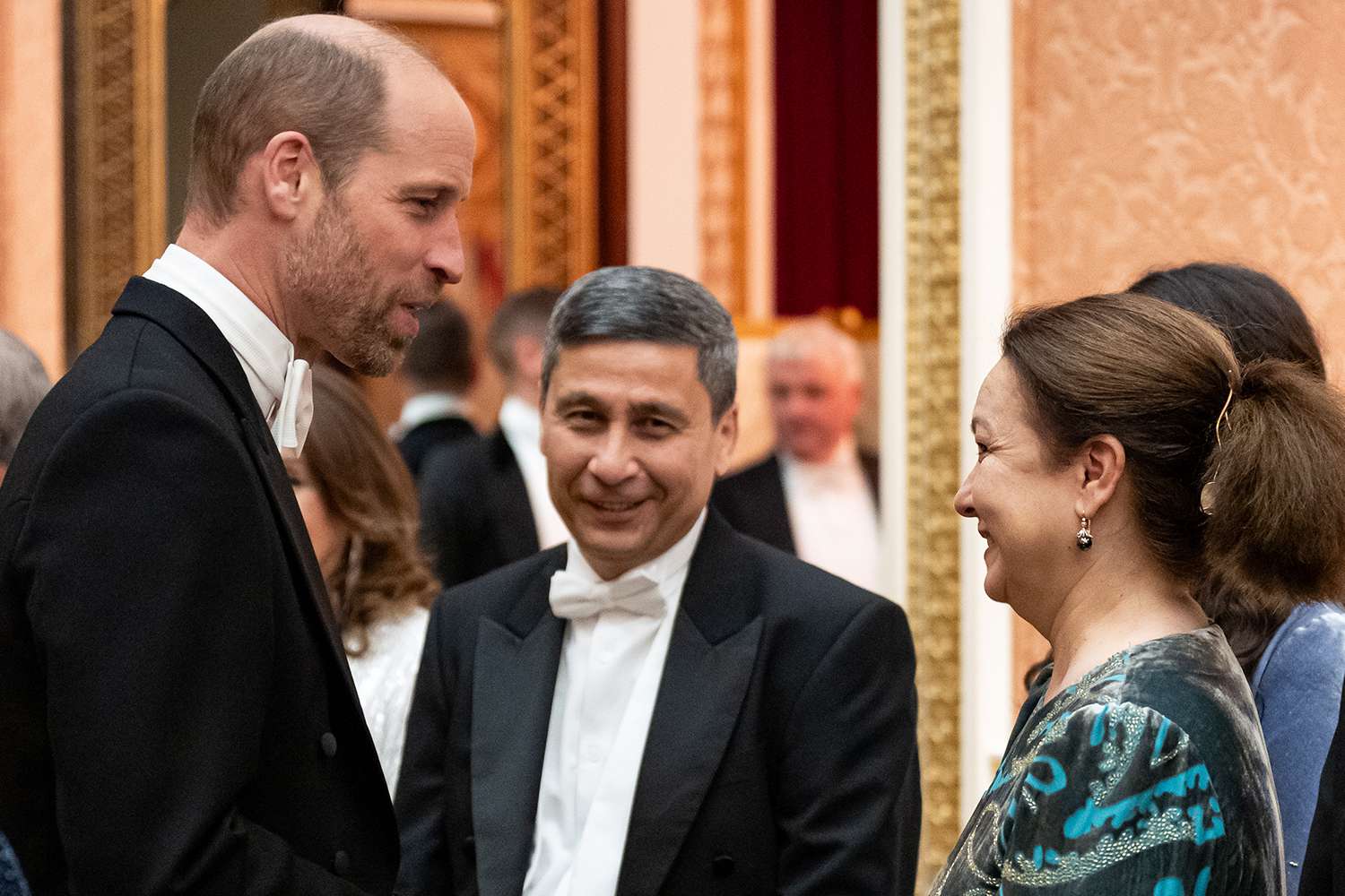 Prince William, Prince of Wales speaks to guests during the Diplomatic Corps reception at Buckingham Palace on November 19, 2024 in London, England.