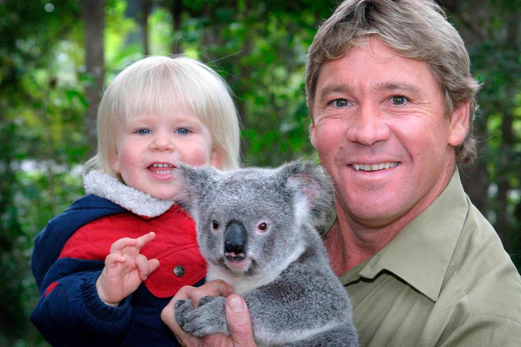 SUNSHINE COAST, AUSTRALIA - JUNE 25, 2005: (EUROPE AND AUSTRALASIA OUT) 'Crocodile Hunter' Steve Irwin with his son, Bob Irwin, and a Koala at Australia Zoo.