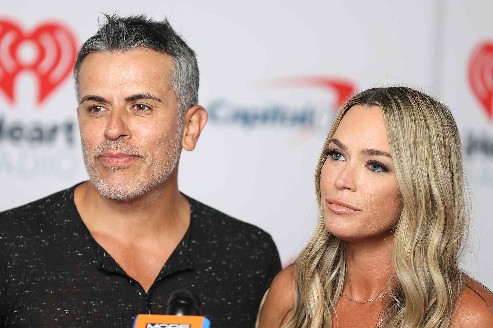 LAS VEGAS, NEVADA - SEPTEMBER 17: (L-R) Edwin Arroyave and Teddi Mellencamp Arroyave are seen backstage at the 2021 iHeartRadio Music Festival on September 17, 2021 at T-Mobile Arena in Las Vegas, Nevada. EDITORIAL USE ONLY. 