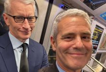 Anderson Cooper Grouchily Takes the Subway with Andy Cohen and Snaps a Selfie: 'You Weren't Attracting Enough Attention?'