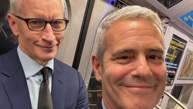 Anderson Cooper Grouchily Takes the Subway with Andy Cohen and Snaps a Selfie: 'You Weren't Attracting Enough Attention?'