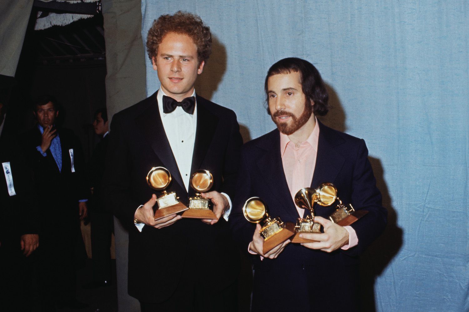 Art Garfunkel and Paul Simon Holding Grammy Awards