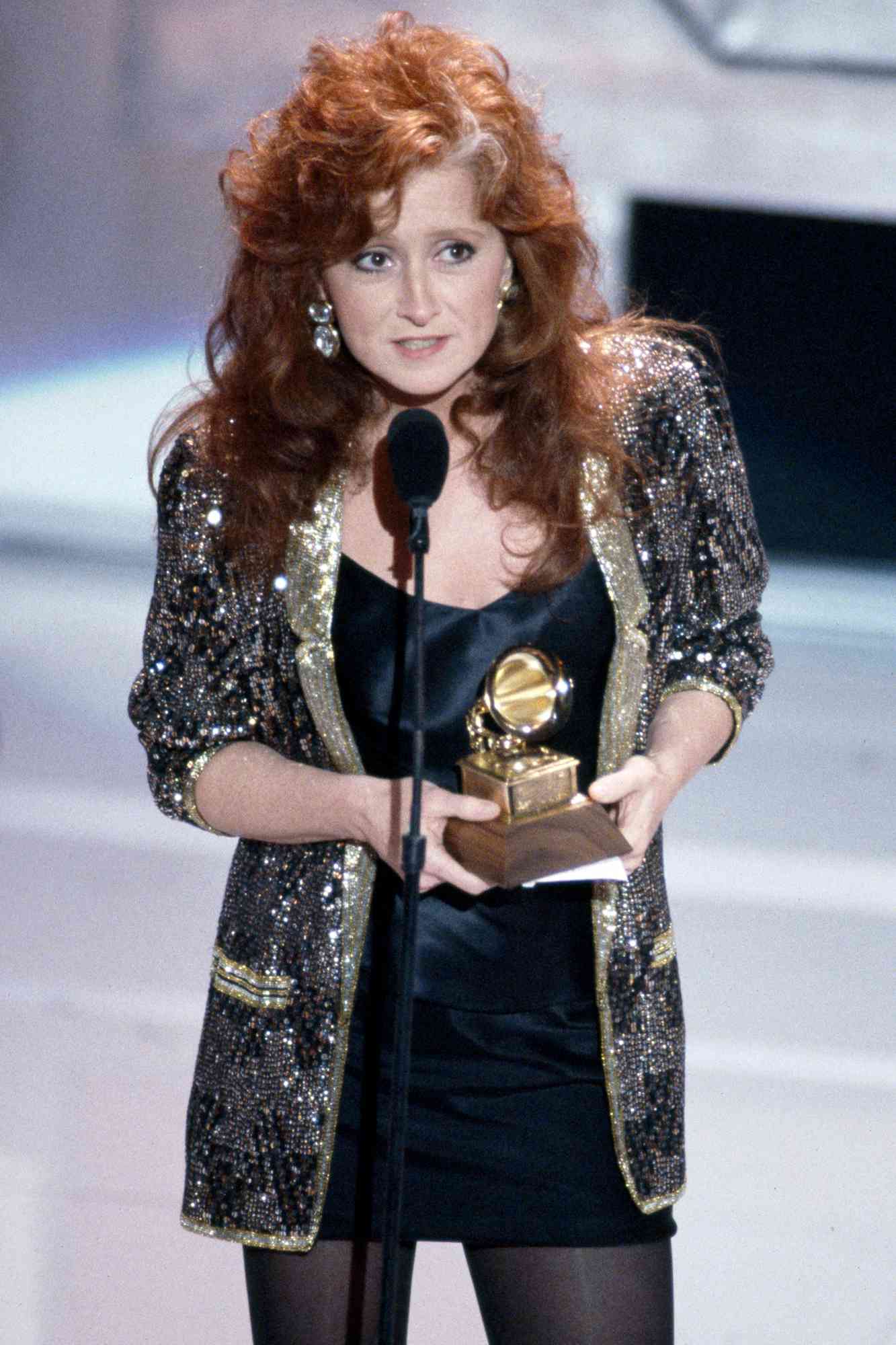 The 32nd Annual Grammy Awards, presented at Shrine Auditorium, Los Angeles. Broadcast on CBS television on February 21, 1990. An event recognizing the achievements and talents of singers, musicians, and music industry persons. Pictured is Bonnie Raitt. 