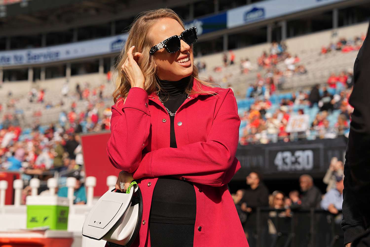 Brittany Mahomes, wife of quarterback Patrick Mahomes, looks on prior to a game between the Kansas City Chiefs and the Carolina Panthers at Bank of America Stadium on November 24, 2024 in Charlotte, North Carolina